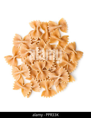 Wholewheat farfalle pasta. Tasty italian pasta isolated on white background. Stock Photo