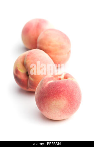 Tasty ripe peaches isolated on white background. Stock Photo
