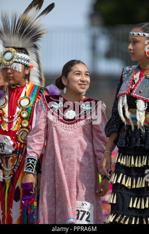 Milwaukee, Wisconsin, USA - September 8, 2018 The Indian Summer Festival, boy and girls wearing traditional native american clothing. Stock Photo