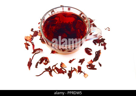 Hibiscus tea in a glass cup on a white background. Stock Photo