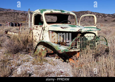 World War II era 1 1/2 ton Chevrolet truck, likely originally built for the US Army, now sits abandoned at a mine site in Hamilton, Nevada. Stock Photo