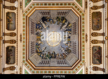 Queluz, Portugal - December 9, 2017: Detail of chandelier in ceiling Inside of rich decorated Queluz Royal Palace. Formerly used as the Summer residen Stock Photo