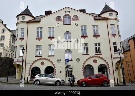 ALESUND, NORWAY - JULY 6, 2018. Alesund town, famous for Art Nouveau or Jugendstil buildings . Aksel Holms Plass building. Stock Photo