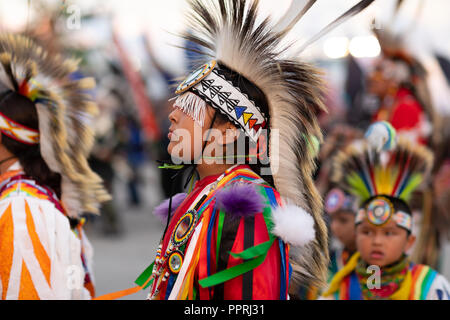 Milwaukee, Wisconsin, USA - September 8, 2018 The Indian Summer Festival, Boy wearing traditional native american clothing at the pow wow competition. Stock Photo