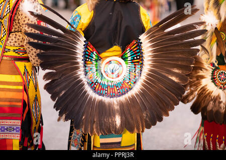 Milwaukee, Wisconsin, USA - September 8, 2018 The Indian Summer Festival, close up of traditional native american clothing with feathers. Stock Photo