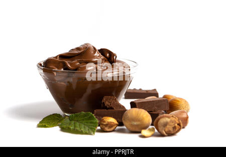 Hazelnut spread with marijuana leaves in a jar isolated Stock Photo
