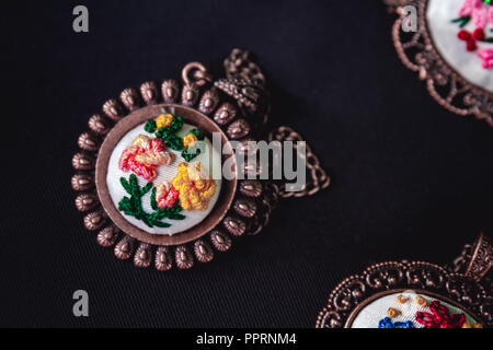 Turkish handmade copper necklaces on dark background Stock Photo