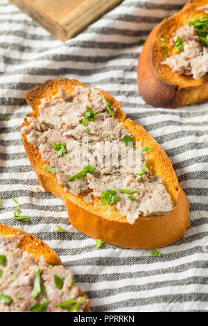 Savory Duck Liver Pate Spread with Toast and Parsley Stock Photo