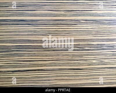 Light wood with dark grain background, smooth surface. Stock Photo