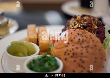 An expensive Camel burger with real golden flakes in Emirates Palace Hotel Stock Photo