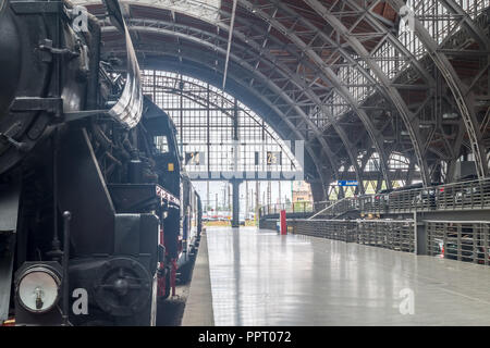 Leipzig, Germany - September 19, 2018: View of a historic steam locomotive at Leipzig Central Station, Germany. Stock Photo