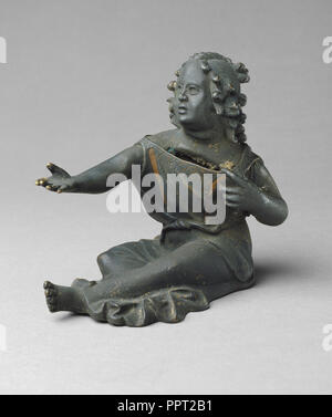 Coin Bank Shaped as a Beggar Girl; Roman Empire; about 25 - 50; Bronze, copper inlay; 12.2 × 13.5 cm, 4 13,16 × 5 5,16 in Stock Photo