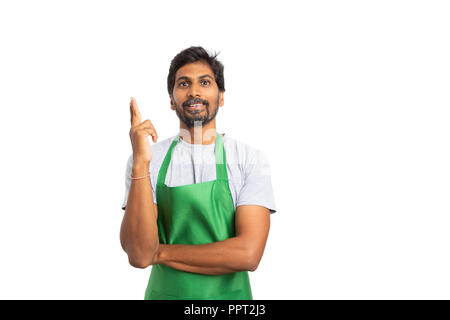 Smiling seller or hypermarket indian employee making great idea gesture with fingers in the air as inspiration concept isolated on white with blank co Stock Photo