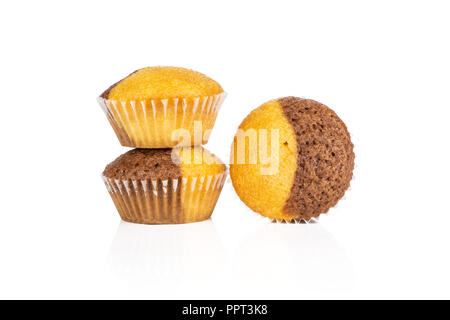 Group of three whole fresh baked marble muffin isolated on white background Stock Photo