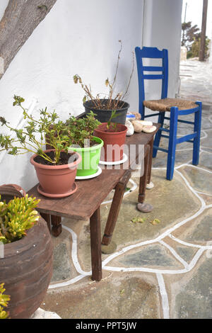 europe greece cyclades sikinos a greek orthodox priest with donkeys ...