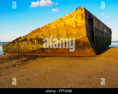 Mulberry Harbour Caisson on Gold Beach in Arromanches, Normandy Stock Photo