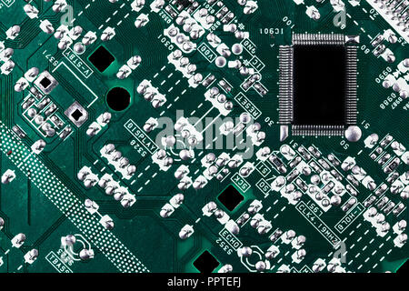 Microchip integrated on motherboard computer science Stock Photo