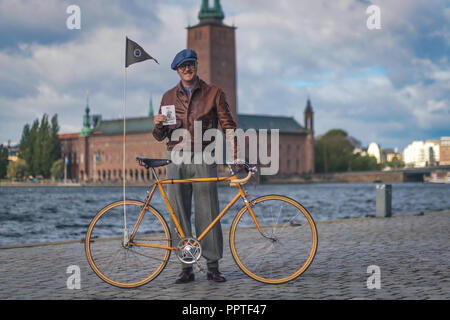 STOCKHOLM, SWEDEN, SEPT 22, 2018: Bike in tweed bicycle tour with vintage bikes and clothes. Before start with backdrop of city hall. Stock Photo