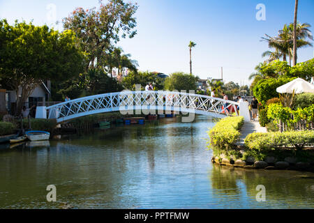 Canals, bridges, and homes in the town of Venice, California Stock Photo