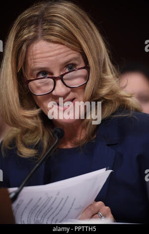Washington, District of Columbia, USA. 27th Sep, 2018. Christine Blasey Ford, the woman accusing Supreme Court nominee Brett Kavanaugh of sexually assaulting her at a party 36 years ago, testifies before the US Senate Judiciary Committee on Capitol Hill in Washington, DC, September 27, 2018. Credit: ZUMA Press, Inc./Alamy Live News. Stock Photo