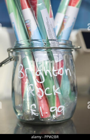 Sticks of iconic rock for sale at the bar in the glass viewing pod on the Brighton i360, on the seafront, in East Sussex, in the UK Stock Photo