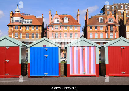 Colourful beach huts on the seafront in Hove, near Brighton, in East Sussex, UK Stock Photo
