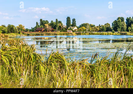 fishing on the lake from inflatable boat Stock Photo