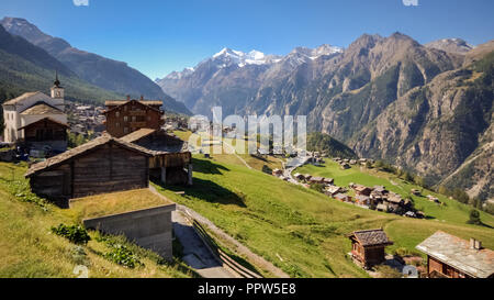 View of the village of Grachen (Valais, Switzerland) on a sunny and clear autumn september day. The village is situated at an altitude of 1,620 metres Stock Photo