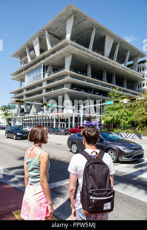 Miami Beach Florida,Alton Road,public Lincoln Center centre parking garage,adult adults man men male,woman women female lady,couple,visitors travel tr Stock Photo