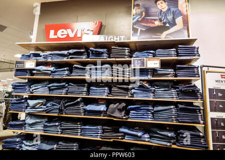 Miami Florida,Kendall,Dadeland mall,Macy's department store,inside  interior,product products display sale,Levi's denim jeans,men's,visitors  travel tra Stock Photo - Alamy