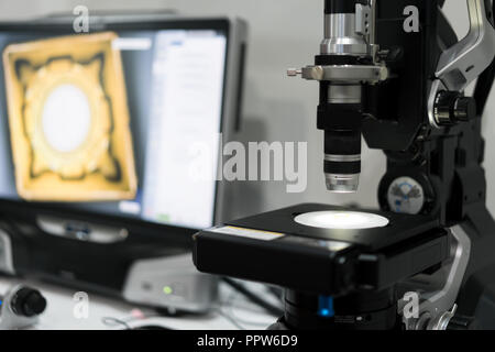 Microelectronics laboratory with the measuring instruments and microscopes. Stock Photo