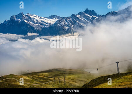 View from Mannlichen at the Bernese Alps (Berner Oberland, Switzerland). It is a mountain (2,343 metre) reachable from Wengen or Grindelwald Stock Photo