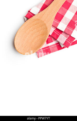 Checkered napkin and wooden spoon isolated on white background. Stock Photo