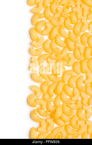 Uncooked elbow macaroni isolated on white background. Stock Photo