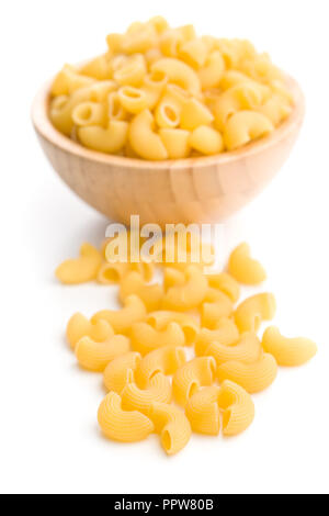 Uncooked elbow macaroni isolated on white background. Stock Photo