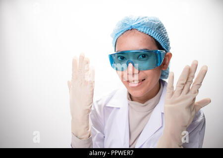 researchers Health care working in life science laboratory. Young female research scientist preparing and analyzing microscope slides in research lab Stock Photo