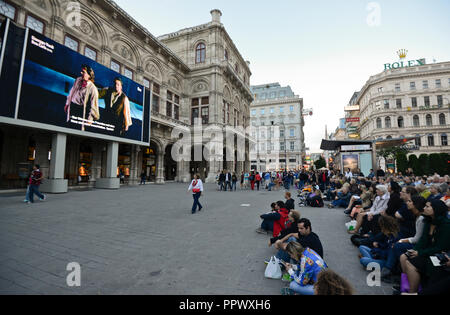 People watching an opera screening. Vienna State Opera, Austria Stock Photo