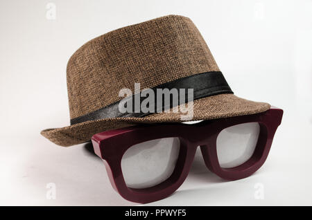 brown tone hat over a large lenses, on a white isolated background. Stock Photo