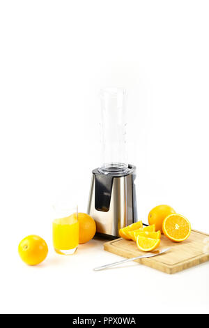 orange juice made from fresh oranges isolated on white background. Stock Photo