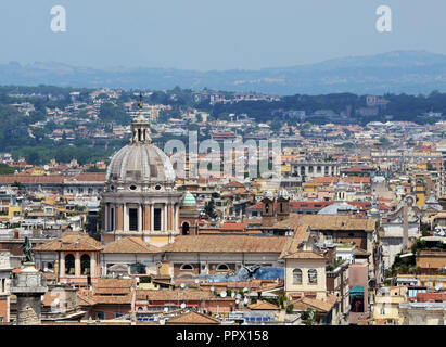View of the Basilica of SS. Ambrose and Charles on the Corso in Rome. Stock Photo