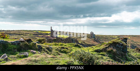 Botallack Tin mines in Cornwall Uk England. . Old tin mine ruins an industry from the past on the cornish coastal path at Old Wheal, also Poldark film Stock Photo