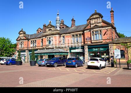 The Victorian Market Hall in the town centre with cars parked in the foreground, Burton upon Trent, Staffordshire, England, UK, Western Europe. Stock Photo