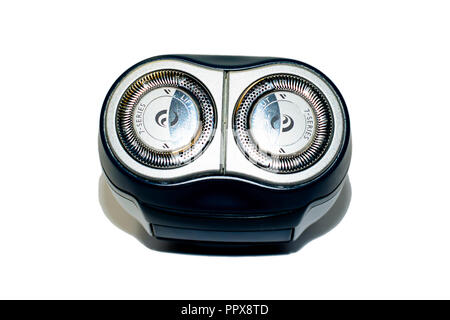 The old electric shaver on white background. Stock Photo