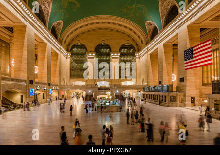 New York, NY / USA - July 11, 2014: Night view of the Main Concourse of Grand Central Terminal, one of the most beloved landmarks in Manhattan. Stock Photo