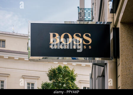 Hugo Boss store signboard. Hugo Boss focuses on developing and of premium fashion and accessories for men and Photo - Alamy
