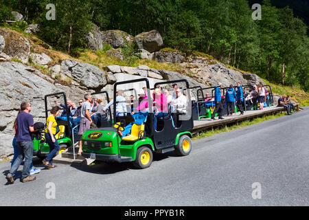 Olden, Norway - August 1, 2018: Troll cars, people on the way to Briksdal or Briksdalsbreen glacier in Olden, Norway Stock Photo