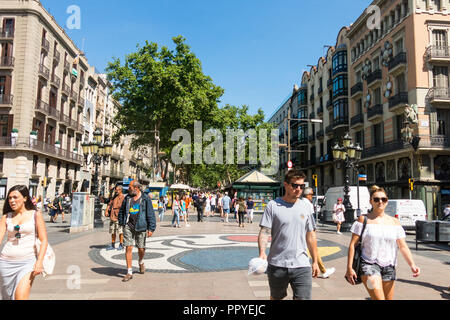 BARCELONA, SPAIN - SEPTEMBER 2: Joan Miro's Pla de l'Os mosaic in La Rambla on September 2, 2017 in Barcelona, Spain. Thousands of people walk daily o Stock Photo