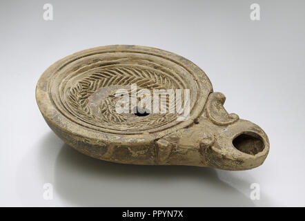 Lamp, North Africa; 1st - 4th century; Terracotta; 2.6 x 2.5 x 10.5 cm, 1 x 1 x 4 1,8 in Stock Photo