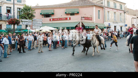 Saint Gilles,Camargue-France 2016 Traditional festival every year in August, the horsemen conduct the bulls running through the streets of the village Stock Photo