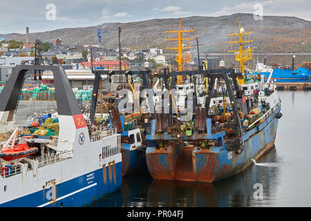 Fleet Of Russian Fishing Trawlers Moored At The Docks In Kirkenes, Finnmark County, Norway. Stock Photo